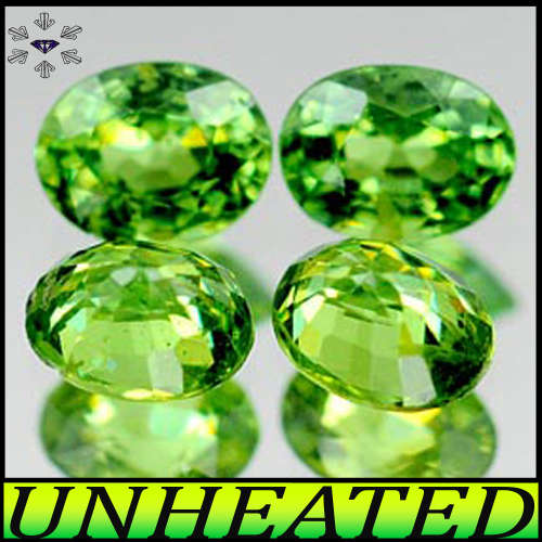 0.52t Two Medium Green Demantoids - Pair Matching Fancy Oval Gems