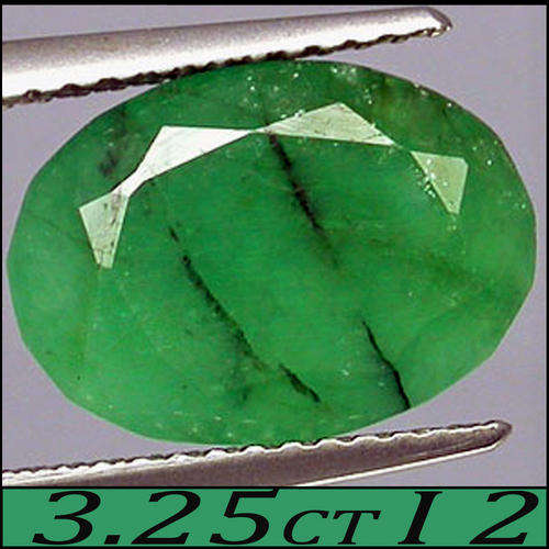 3.25 CT MEDIUM GREEN NATURAL UNTREATED COLUMBIAN EMERALD GEMSTONE POLISHED IN AN OVAL.