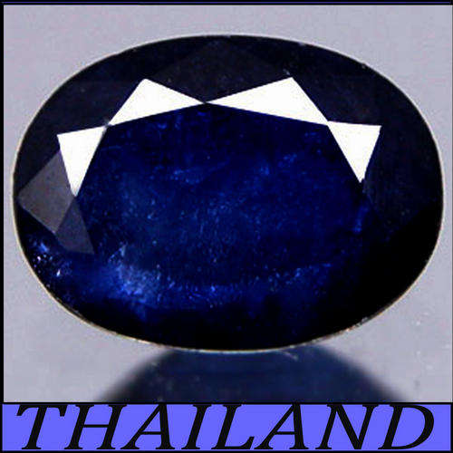 1.00 CT NATURAL BRILLIANTLY MAGNIFICET MIDNIGHT BLUE SAPPHIRE GEMSTONE POLISHED IN AN OVAL.