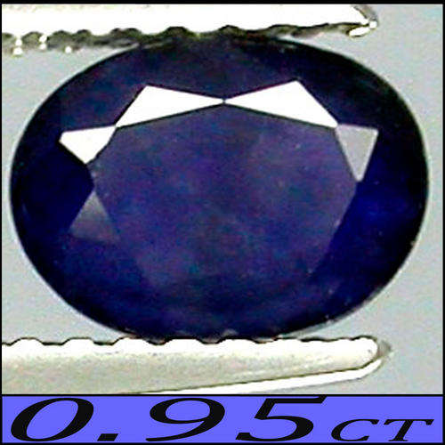 0.95 CT NATURAL MIDNIGHT BLUE SAPPHIRE GEMSTONE POLISHED IN AN OVAL.