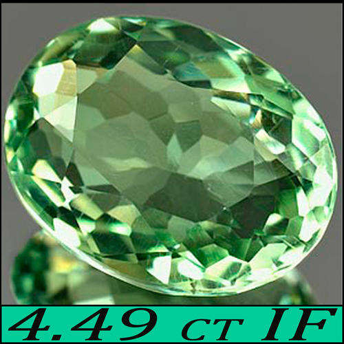 4.49 CT LOVELY LIME GREEN NATURAL PRASIOLITE GEMSTONE IN A MODERN BRILLIANT POLISHED OVAL.