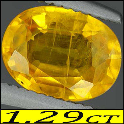 1.29 CT YELLOW GOLDEN NATURAL SAPPHIRE, A PRECISION POLISHED MODERN OVAL GEMSTONE.