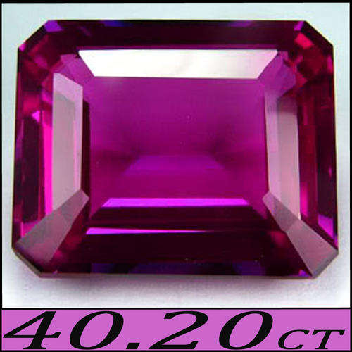 40.25 PERFECTLY POLISHED EMERALD CUT DEEP PURPLE RED SAPPHIRE, A CHATHAM SYNTHETIC CREATION.