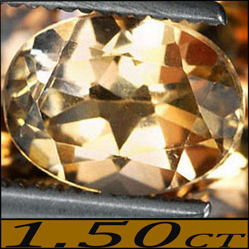 1.50 CT NATURAL IMPERIAL LIGHT BRANDY TOPAZ, AN OVAL POLISHED UNHEATED GEMSTONE.