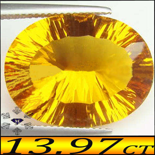 13.97 CT NATURAL GOLDEN CITRINE GEMSTONE POLISHED IN A CONCAVE OVAL.