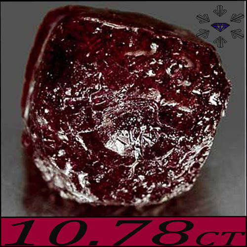 10.78 CT SPECTACULAR NATURAL SCARLET RED RUBY, A TANZANIA ROUGHT TREATED GEMSTONE.