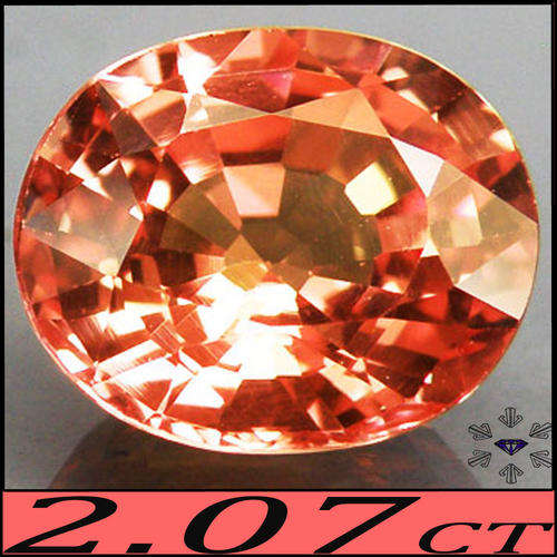 2.19 CT ORANGE CHERRY BLOSSOM SAPPHIRE, AN OVAL POLISHED GEMSTONE FROM TANZANIA.