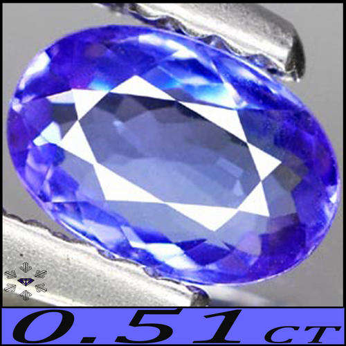 0.51 CT CARESSING EYE CLEAN NATURAL BLUE TANZANITE GEMSTONE WITH INTERESTING VIOLET FIRE.