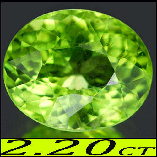 2.20 CT BRIGHT OLIVE GREEN NATURAL PERIDOT, A PORTUGUESE OVAL POLISH THAI GEMSTONE.