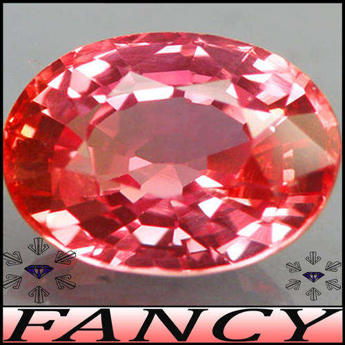 3.21 CT LOVELY ORANGEY PINK COLOUR PADPARADSCHA SYNTHETIC SAPPHIRE, POLISHED IN A PRECISE OVAL.