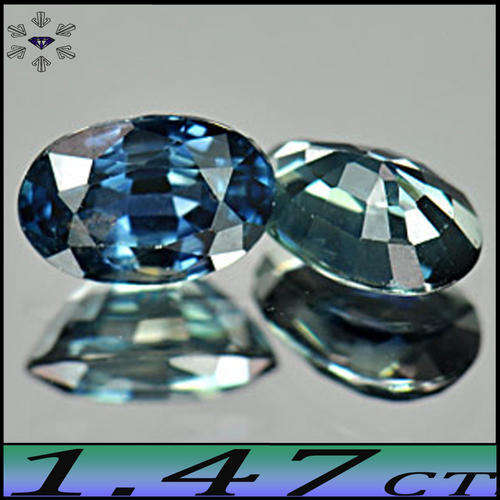 1.47CT STUNNING GREENISH VIVID BLUE PAIR OF OVAL MADAGASCAN SAPPHIRE GEMSTONES.