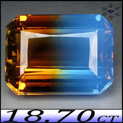 18.70CT BEAUTIFUL BLUE AND GOLDEN OCTAGON POLISHED BI-COLOUR QUARTZ (HYDROTHERMAL).
