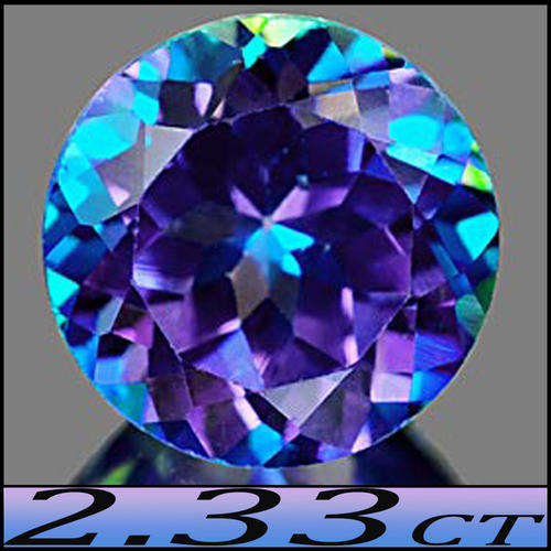 2.33ct CELEBRITY LURE TOPAZ [IF] ~ BLUE AND PURPLE FIRE IN A FLAWLESS ROUND GEM