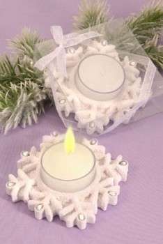 Snowflake-shaped candle holder