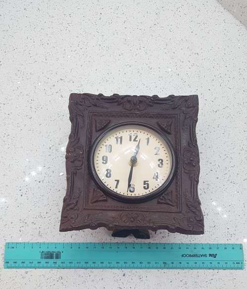 Stunning small cast iron mantel clock!