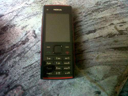 LATE ENTRY. NOKIA X2 IN NEW CONDITION, CHARGER, EAR PHONES AND ORIGINAL BOX INCLUDED.