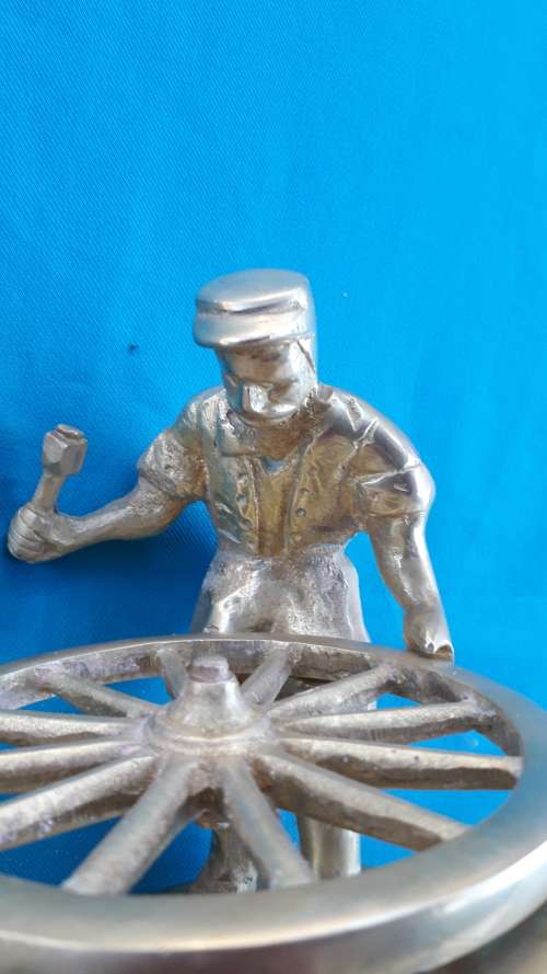 VINTAGE SOLID   BRASS ORNAMENT  "BLACKSMITH AT WORK ON HIS TRADE"