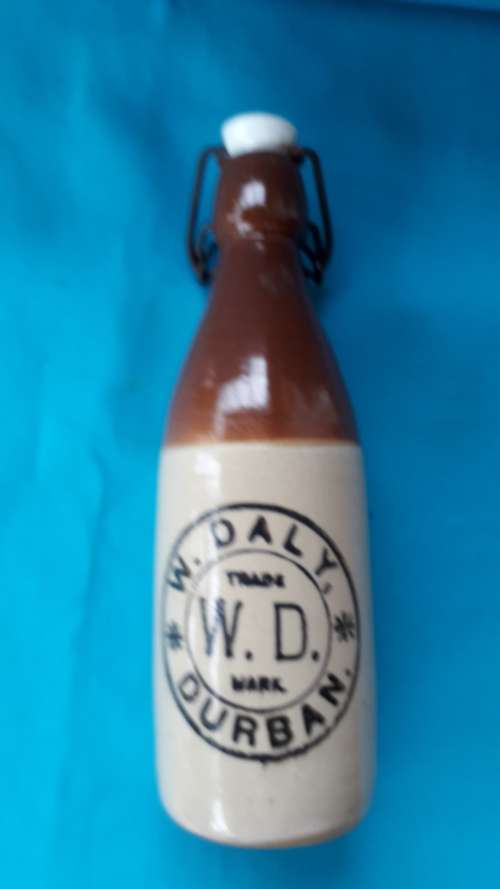 W. DALY  STONEWARE  GINGER BEER BOTTLE   WITH LID