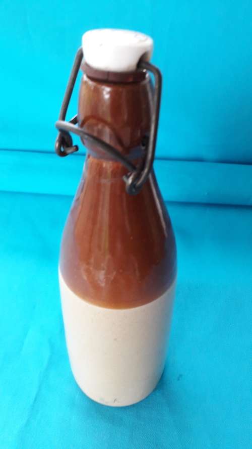 W. DALY  STONEWARE  GINGER BEER BOTTLE   WITH LID