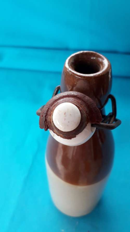 W. DALY  STONEWARE  GINGER BEER BOTTLE   WITH LID