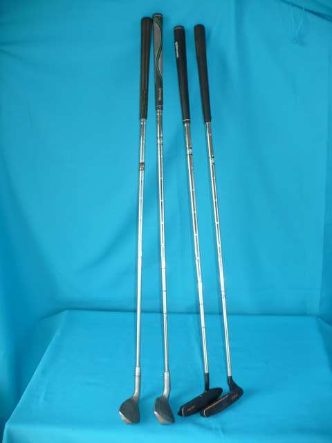 4 GOLF CLUB STICKS