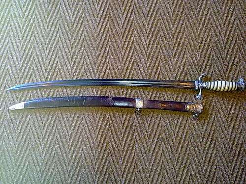 +_1750 German Hunting sword with solid silver eagle head and trim