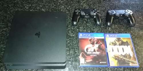 PS 4 1Tb console + 2 games + 2 remotes