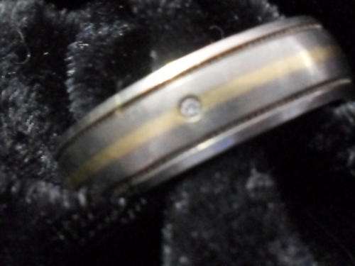 9ct Gold combined with titanium with genuine diamond