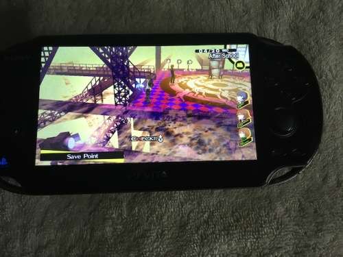 PS Vita Console - with charger and games