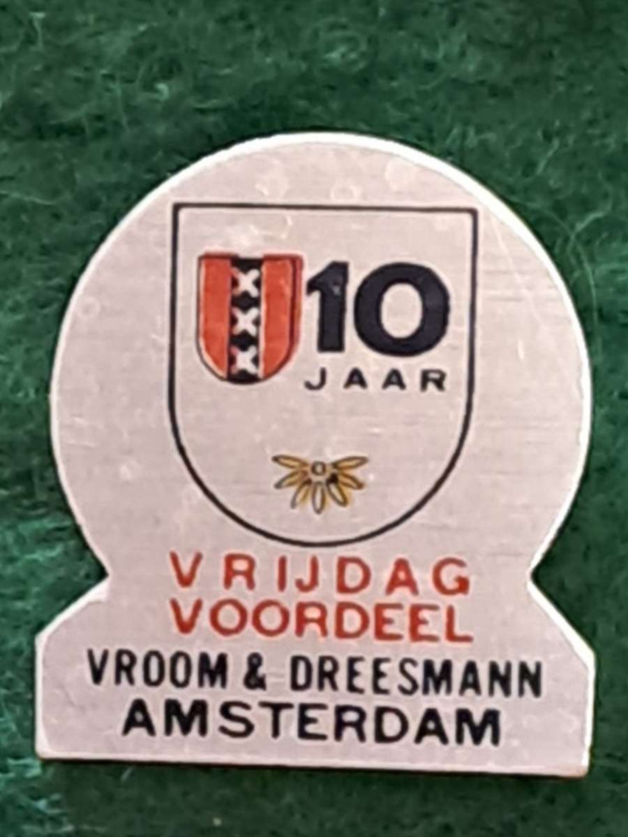Pin: Vintage Dutch Advertising  - `10 Jaar Vrijdag Voordeel Vroom & Dreesmann Amstelveen  `  -  Blue