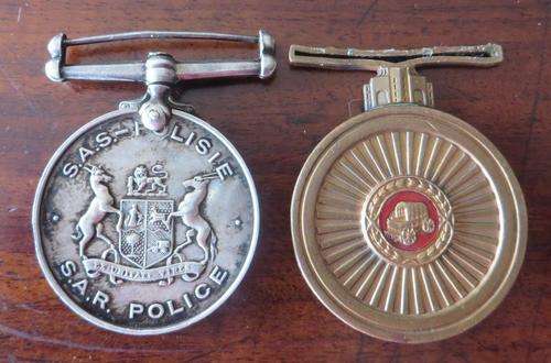 Pair of - S.A.R Police medals awarded to - Sersant A.J Smit