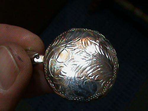 LARGE ROUND LOCKET IN STERLING SILVER