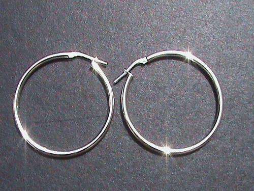 MEDUIM SIZE SOLID STERLING SILVER HOOP EARRINGS....