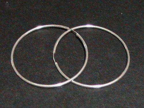 LARGE STERLING SILVER SLEEPER EARRINGS............