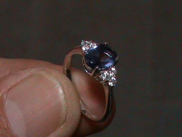 SOLID STERLING SILVER RING. TANZANITE COLOR AND WHITE CZ STONES.   SIZE J 1/2