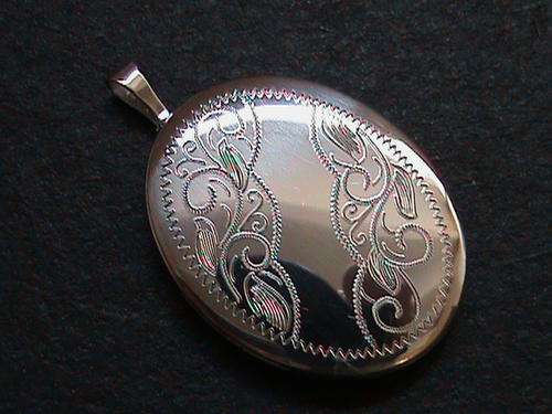 SOLID STERLING SILVER LOCKET.   QUALITY DESIGN, AND ENGRAVED