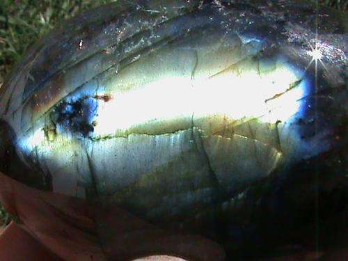 A GRADE LABRADORITE GALET.  STUNNING MIX OF COLOR REFLECTIONS