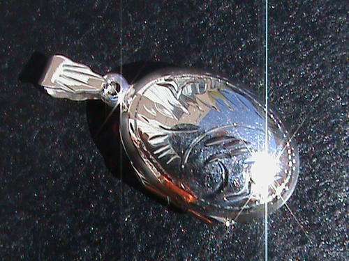 SOLID STERLING SILVER OVAL LOCKET.   ENGRAVED