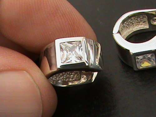 SOLID STERLING SILVER CLIP EARRINGS.  WHITE CZ STONES