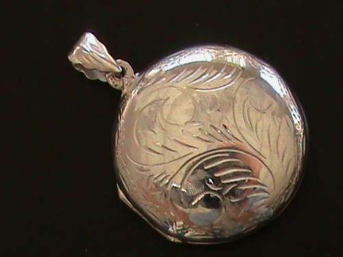 LARGE SOLID STERLING SILVER LOCKET.