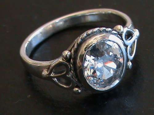 SOLID STERLING SILVER RING.  WHITE CZ STONE.   SIZE K