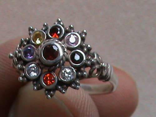 SOLID STERLING SILVER RING.  MIX CZ STONES