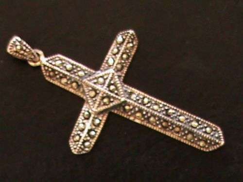 LARGE CROSS IN SOLID STERLING SILVER ,  WITH MARCASITE STONES.