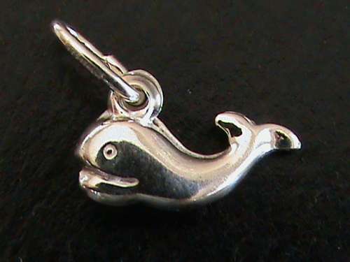 WHALE CHARM IN SOLID STERLING SILVER.