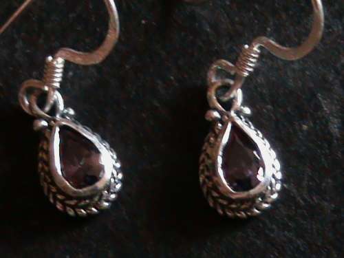 SOLID STERLING SILVER EARRINGS.  PURPLE CZ STONES