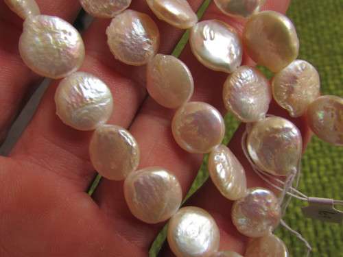 10 MM COIN PEARLS.  GOOD QUALITY.  40 CM LONG STRING