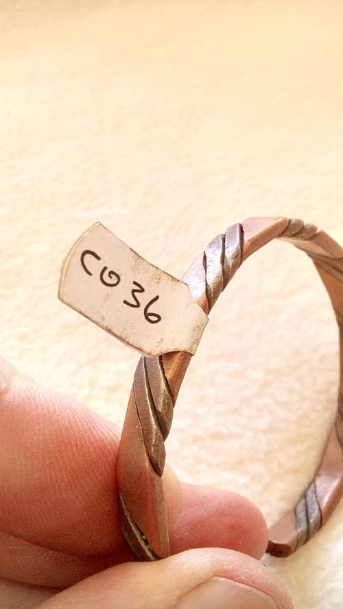 RED COPPER AND METAL WIRE BRACELET.  ADJUSTABLE SIZE.   6.5 MM WIDE