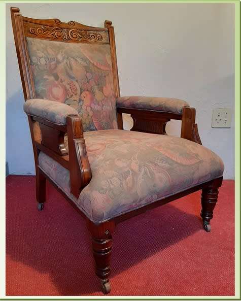 ANTIQUE EDWARDIAN GRANDFATHER CHAIR ON CASTORS  SOLID TEAK