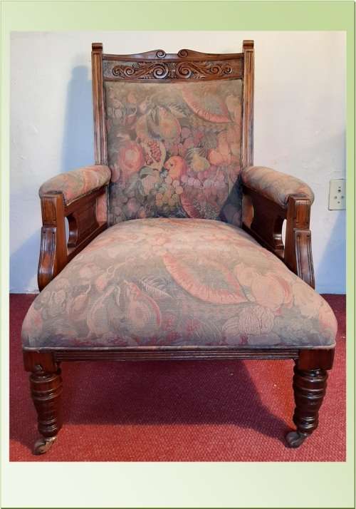 ANTIQUE EDWARDIAN GRANDFATHER CHAIR ON CASTORS  SOLID TEAK