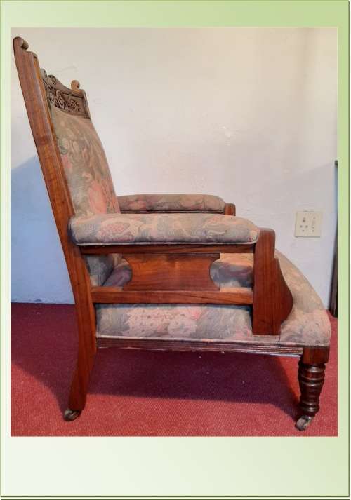 ANTIQUE EDWARDIAN GRANDFATHER CHAIR ON CASTORS  SOLID TEAK